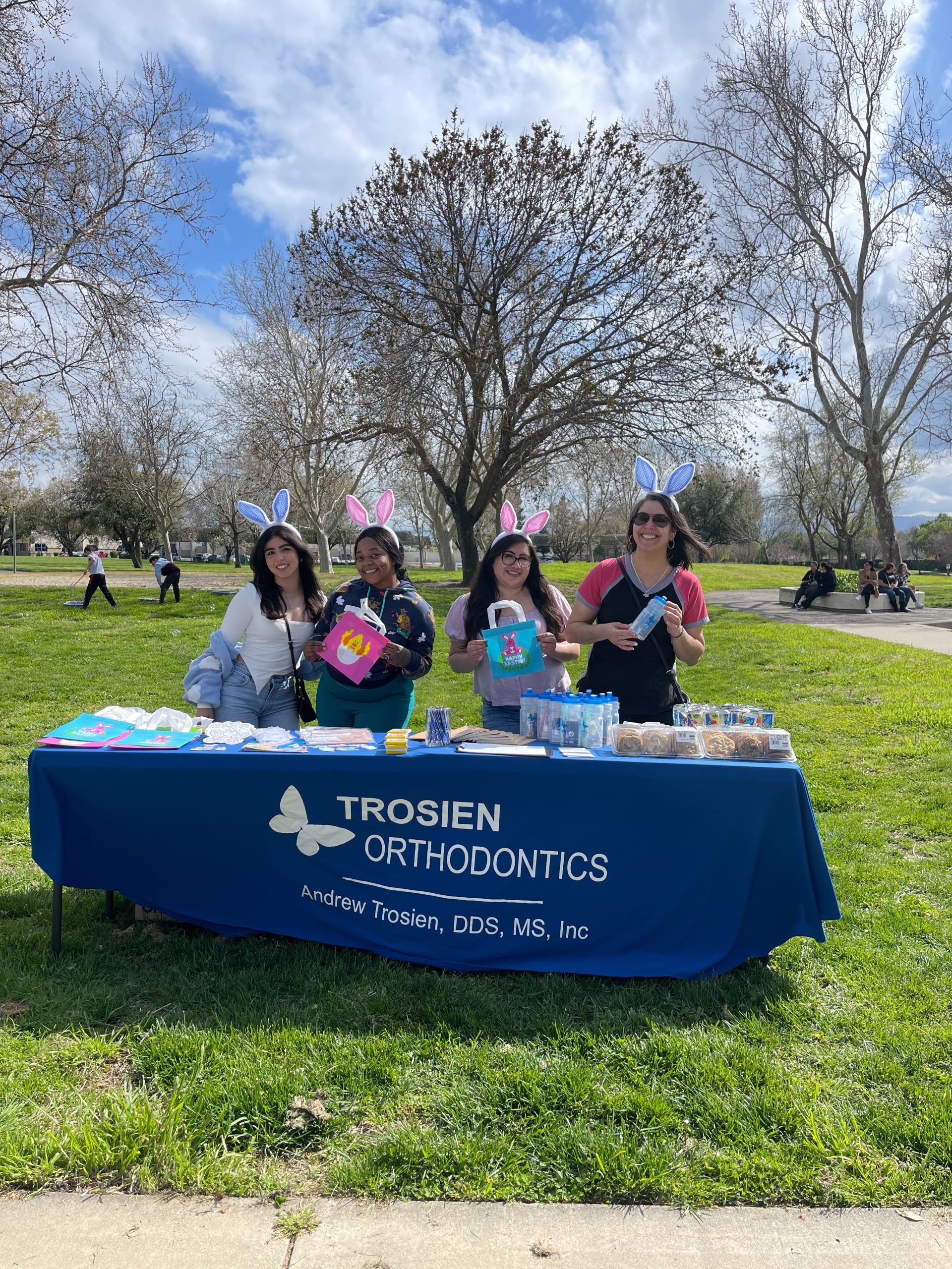 Staff photographed at a community event