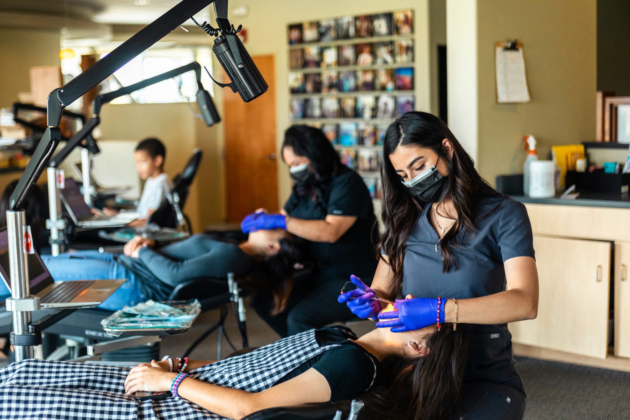 Orthodontic staff working on patients